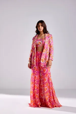 FUSCHIA PINK BLAZER WITH BUSTIER AND FUSCHIA FLORLA JAAL PRINTED BELL BOTTOM PANTS