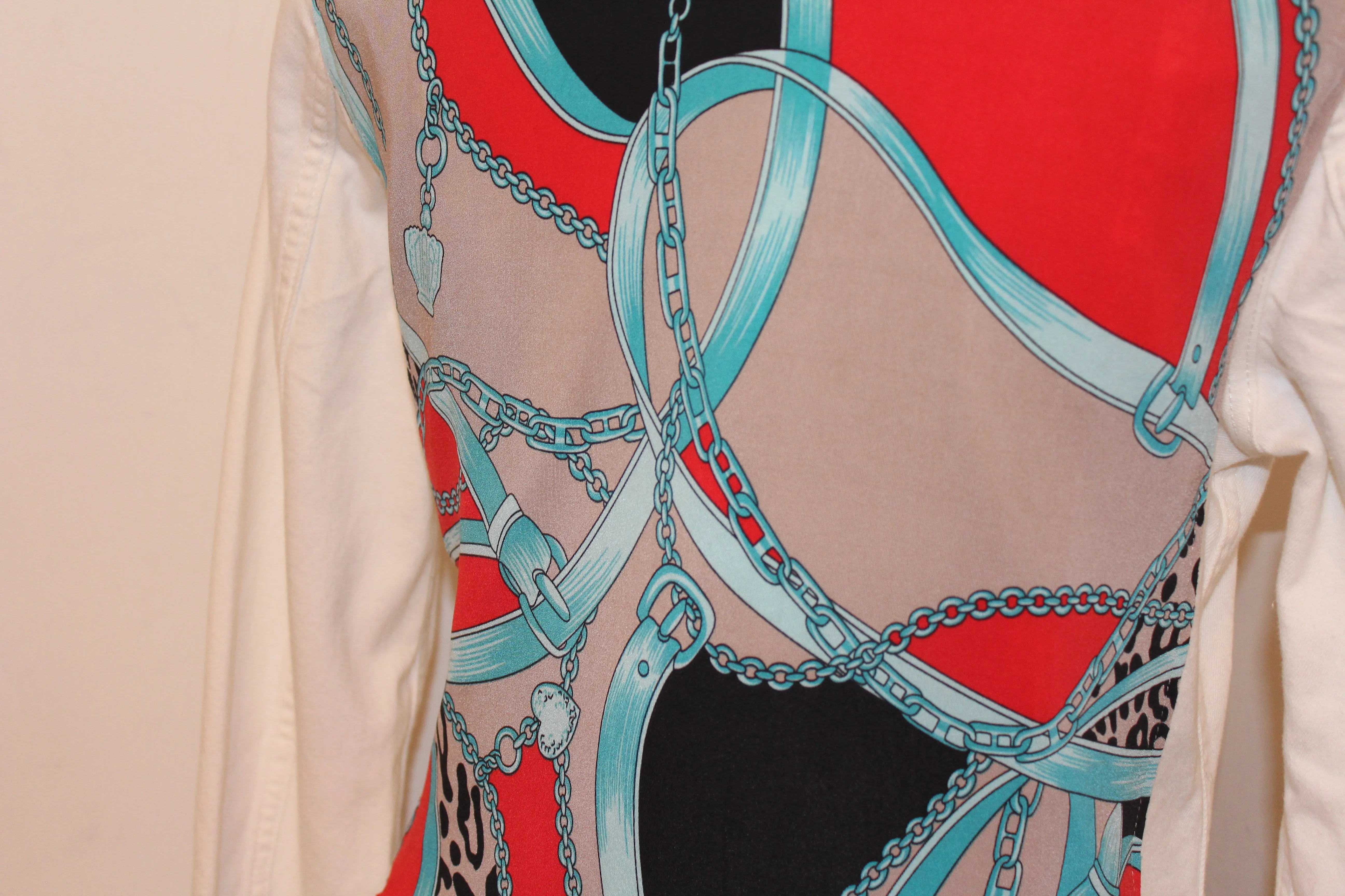 White Denim Jacket with Turquoise and Red Scarf